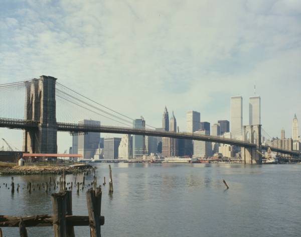 Brooklyn Bridge View looking west from Brooklyn shore with pier pilings in left foreground 
(HAER, NY,31-NEYO,90-77)