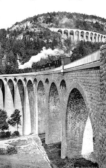 Viaduc des Crottes Post card Caption: 'The train leaves Morez for Saint-Claude, in the background the viaduc des Crottes.'