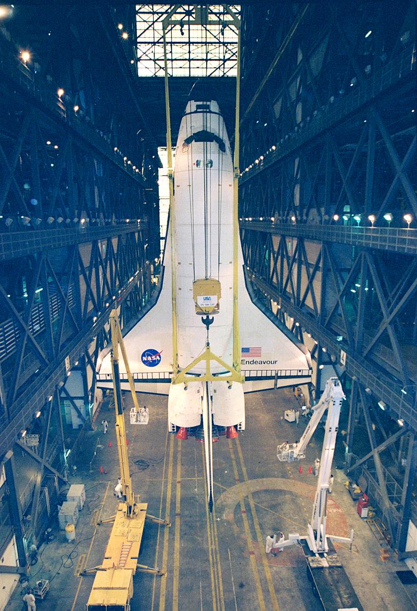 Vehicle Assembly Building (VAB) The orbiter Endeavour is suspended in a vertical position inside the Vehicle Assembly Building where it will be mated with its solid rocket boosters and external tank. Endeavour is scheduled to fly on mission STS-88, the first Space Shuttle flight for the assembly of the International Space Station, on December 3, 1998. The primary payload on the mission is the Unity connecting module, which will be mated to the Russian-built Zarya Control Module already in orbit at that time.
