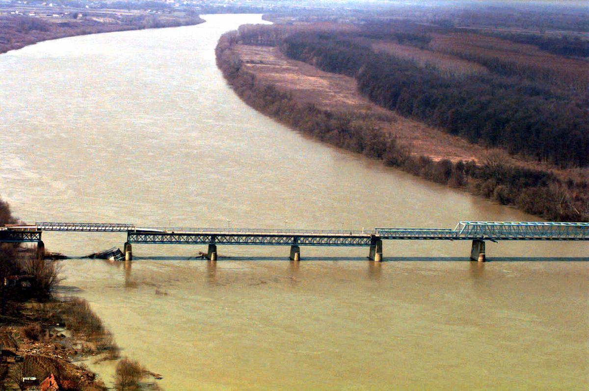 Media File No. 80272 Aerial Shot of the Brcko Bridge after it was repaired by Implementation Forces (IFOR) in support of Operation JOINT ENDEAVOR. The bridge divides Serbia (right) and Croatia (left)