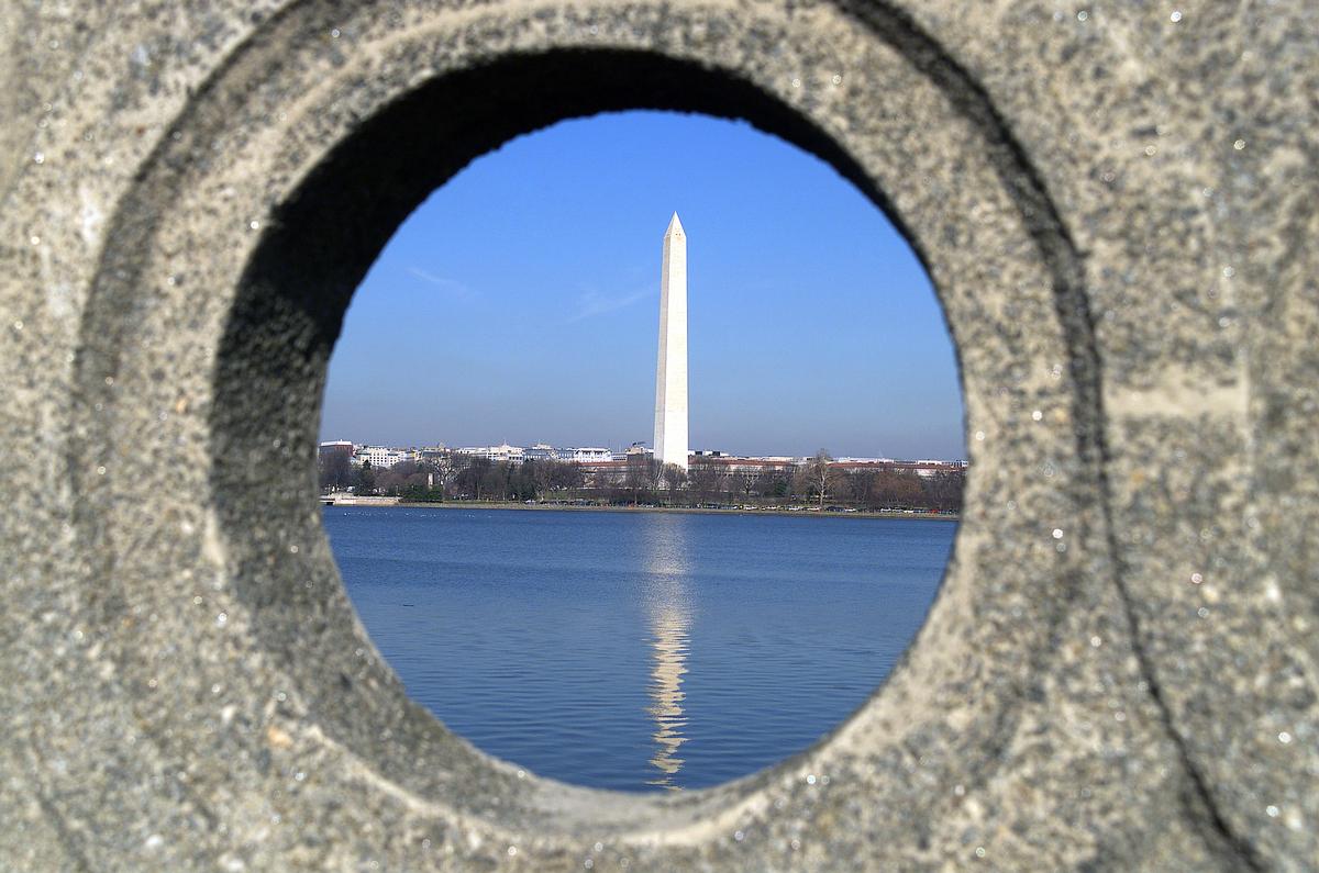 A view of the Washington Monument as seen through a porthole from the bridge near the Jefferson Memorial, in Washington, DC 