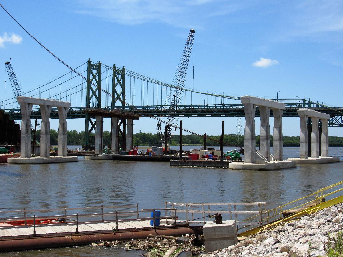 I-74 Bridge construction from the river bank in Bettendorf, Iowa 