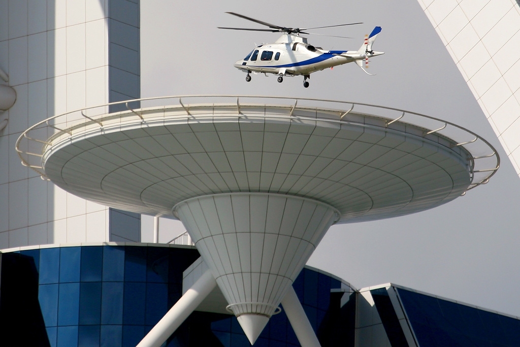 Lifting off from the Burj-al-Arab's helipad for a transfer to the airport or sightseeing flight 
