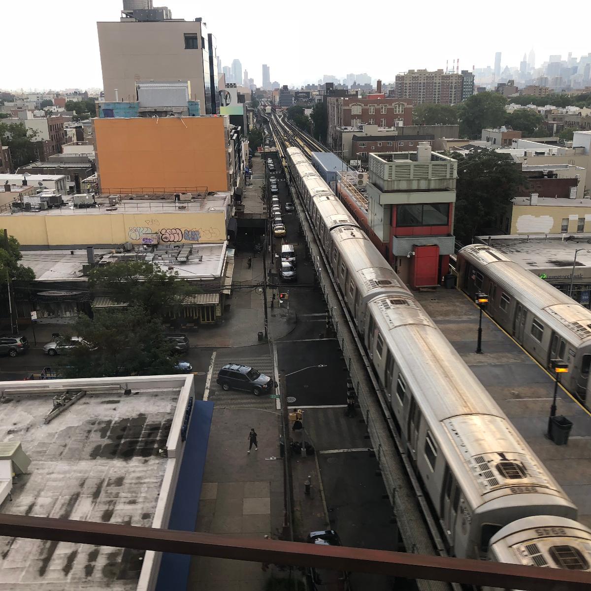 South end of the Astoria–Ditmars Boulevard (BMT Astoria Line) station from above Taken from Amtrak train 2165 on the New York Connecting Railroad viaduct in Queens, New York.