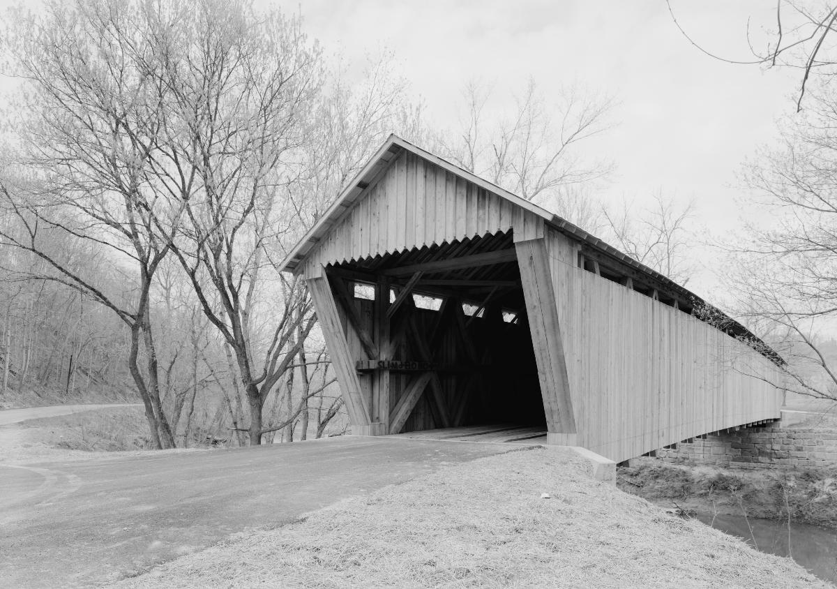 Southern end of the Bennett's Mill Covered Bridge Carries KY 2125 over Tygart's Creek west of Greenup in Greenup County Kentucky United States. Built in 1855, it is listed on the National Register of Historic Places.