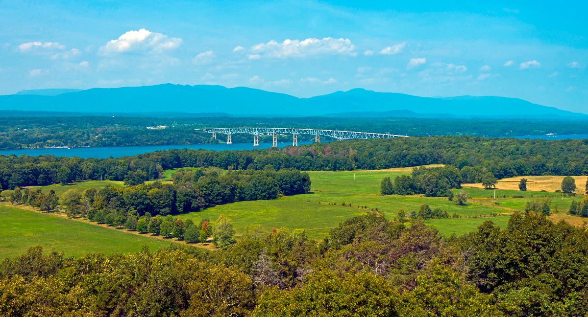 The lower Catskill Escarpment and Kingston–Rhinecliff Bridge over the Hudson River seen from the fire tower in Ferncliff Forest, Rhinebeck, New York 