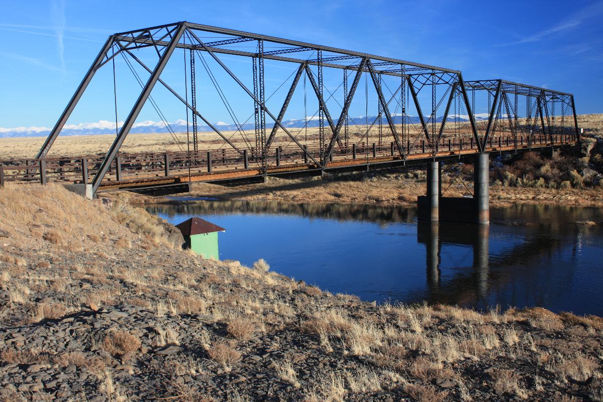 Costilla Crossing Bridge, Colorado Listed on the National Register of Historic Places (by that name).
The Sangre de Cristos of southern Colorado and northern New Mexico behind the (aka) Lobatos bridge, taken from the west (Conejos County) side of the Rio Grande.