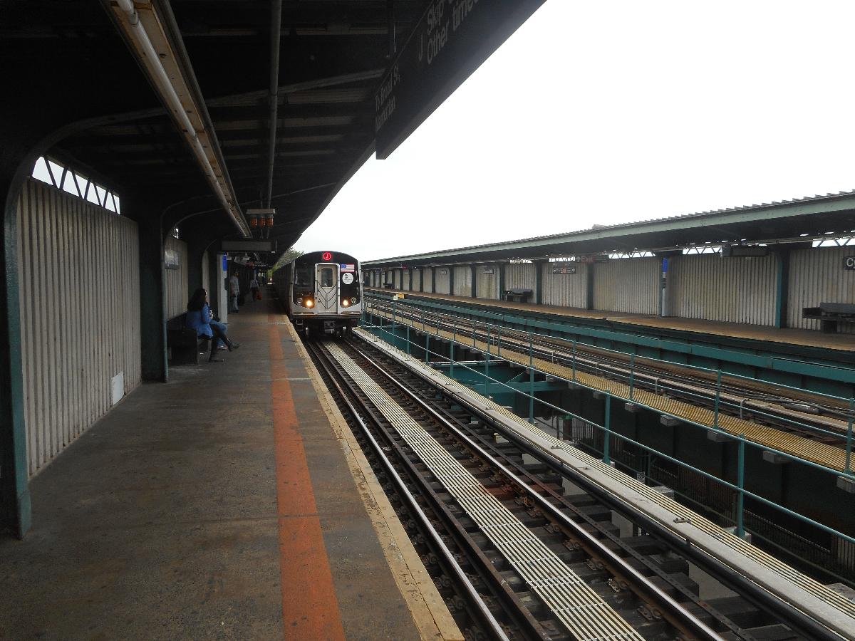 A Lower Manhattan-bound R160 train arrives at the Cypress Hills Elevated Railway station on the BMT Jamaica Line in Cypress Hills section of Brooklyn 