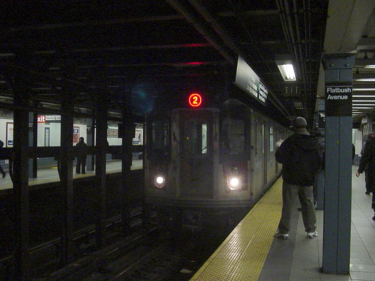 A 2 (New York City Subway service) train arrives at the Brooklyn College – Flatbush Avenue (IRT Nostrand Avenue Line) station, northbound track 