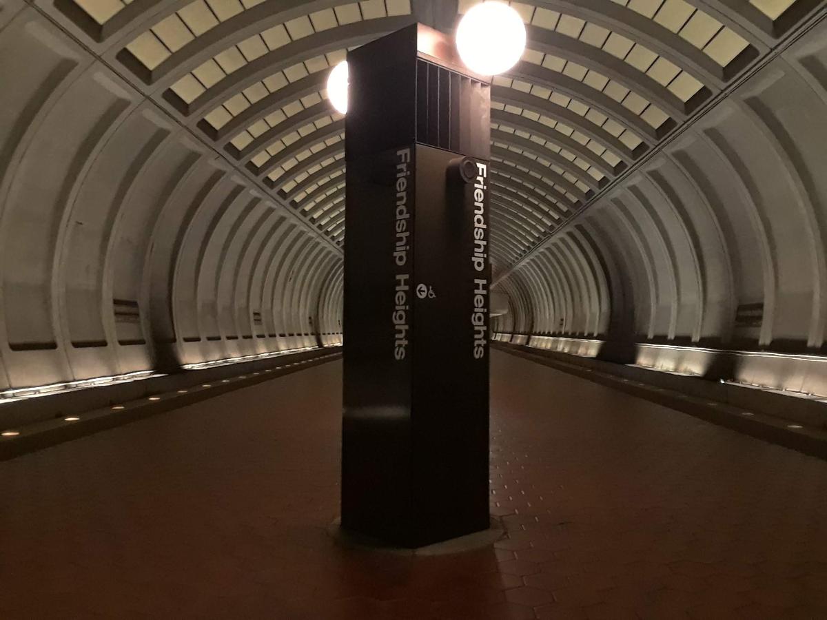 Platform light and sign at Friendship Heights WMATA Red Line station 