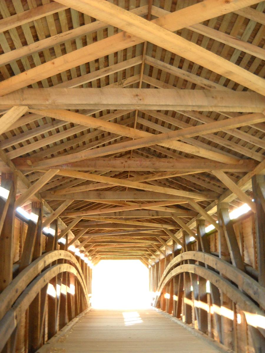 Gilpin's Falls Covered Bridge As rehabilitation completed in 2010 by Engineers, Wallace, Montgomery &amp; Associates, LLP and Contractor, Kinsley Contractors. Inside the bridge showing structural members.
