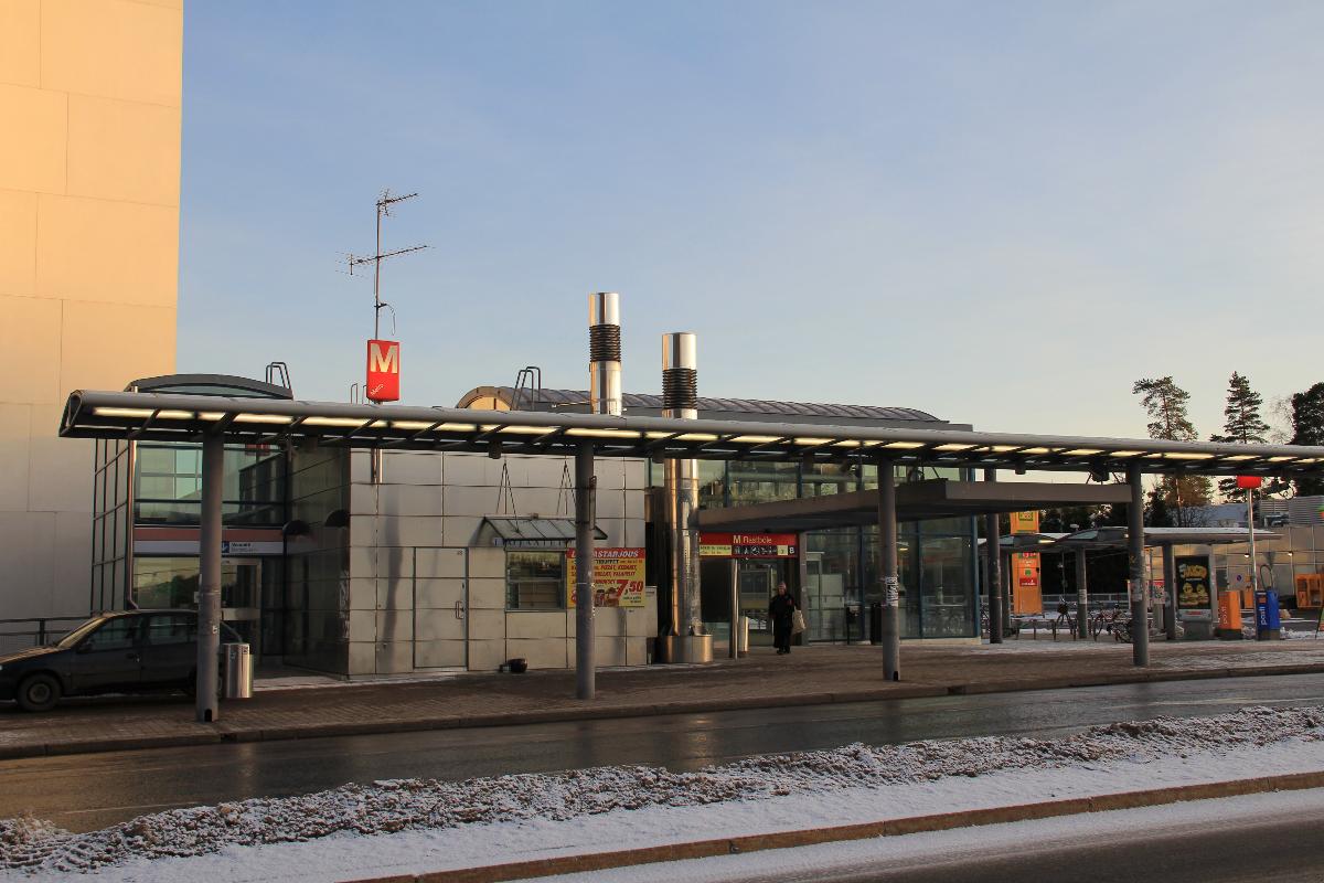 Rastila Metro station and apartment building Helsingin Viuhka in Rastila, Helsinki, Finland are located side by side 