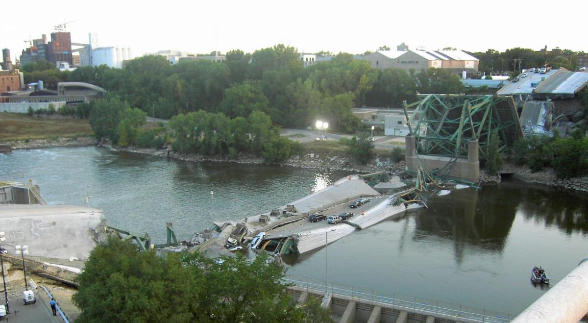The scene at the I-35W Mississippi River Bridge, the first morning after its collapse 