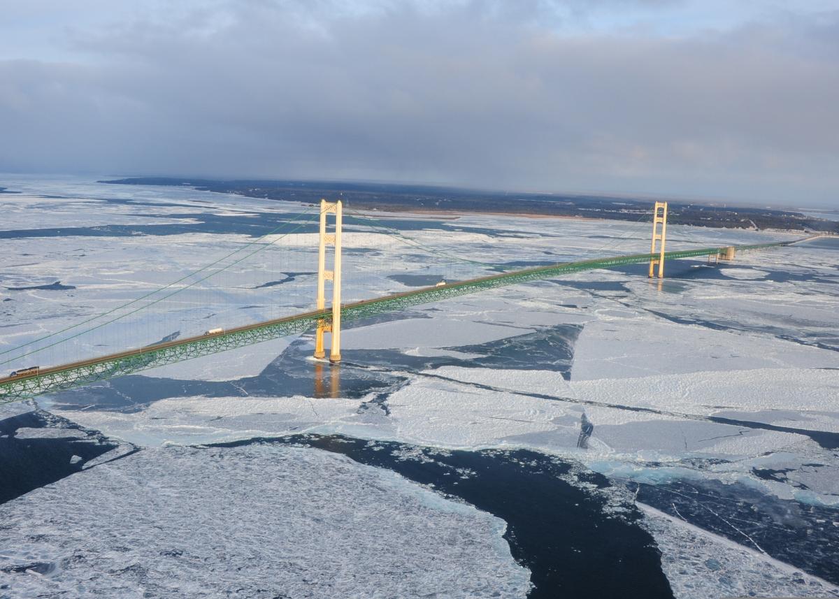Mackinac Bridge Ice forms in the Straits of Mackinac, underneath the Mackinac Bridge, near St. Ignace, Mich., Jan. 24, 2011. The Coast Guard's Research and Development Center in New London, Conn., along with other agency partners tested and evaluated methods for removing spilled oil from an icy environment.