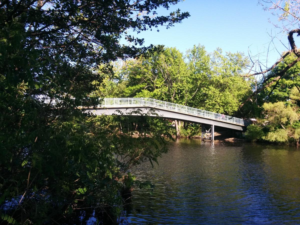 Cpl. Joseph U. Thompson Footbridge across the Charles River in Watertown, Massachusetts, USA. Looking downstream from the north bank 
