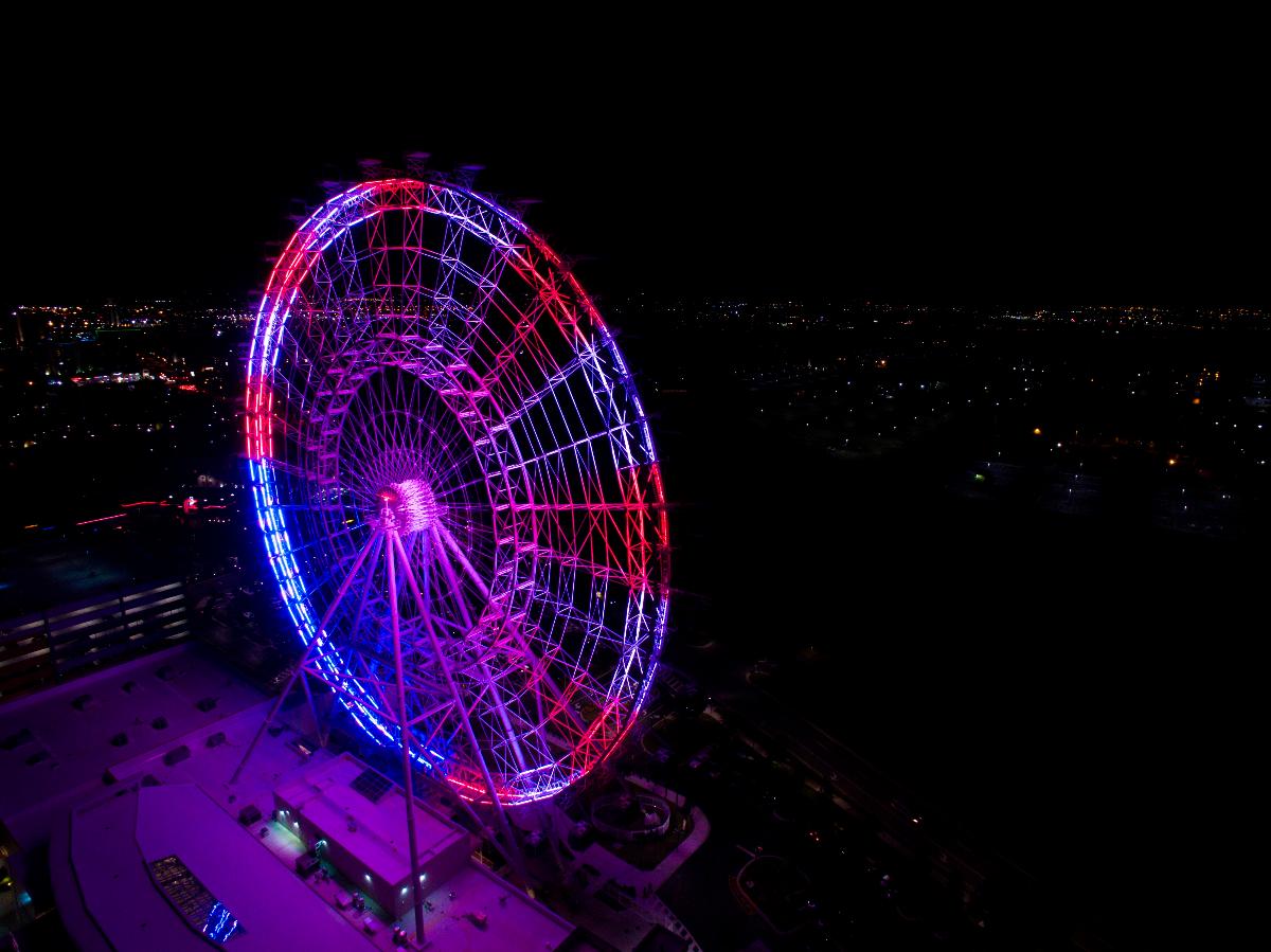 Orlando Eye This aerial image was taken on September 11, 2015 when the Orlando Eye was displaying patriotic colors.