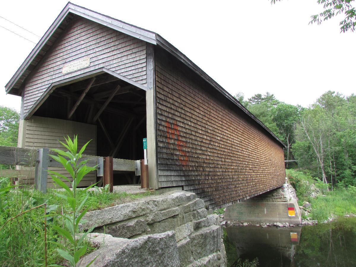 RobyVille Bridge crosses the Kenduskeag Stream in the town of Corinth, Maine It is the oldest surviving example of a Long truss covered bridge in the state.
