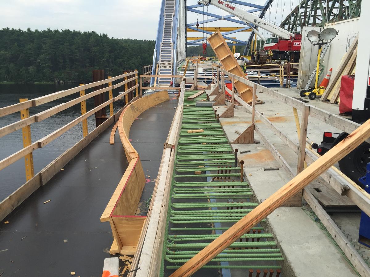 John Greenleaf Whittier Bridge Wooden formwork is laid to outline the overlooks along the future Shared-Use Path at Span 4 on the new northbound bridge.