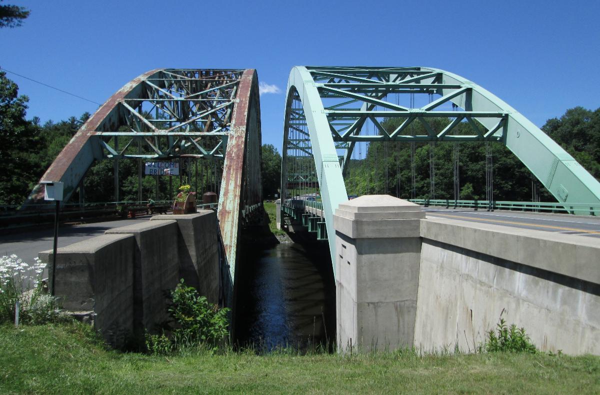 Chesterfield-Brattlebro Bridges The Justice Harlan Fiske Stone Bridge for pedestrians and bicycles (left) and the United Stated Navy Seabees Bridge for cars and trucks (right) as seen from Chesterfield, New Hampshire, looking west