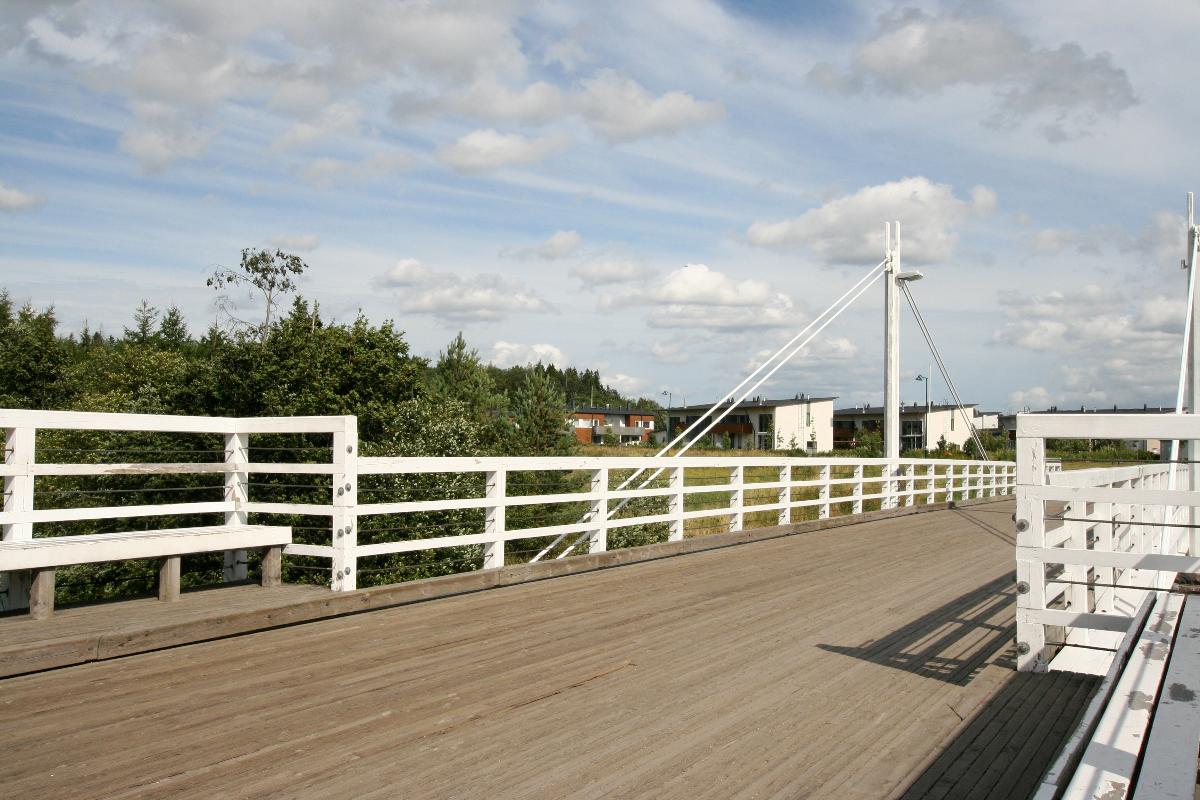 Pedestrian bridge over Vantaa river in Tammisto, Finland 