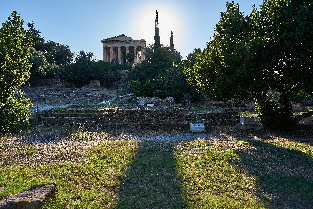 The ruins of the Temple of Apollo Patroos In the background, the Temple of Hephaestus.