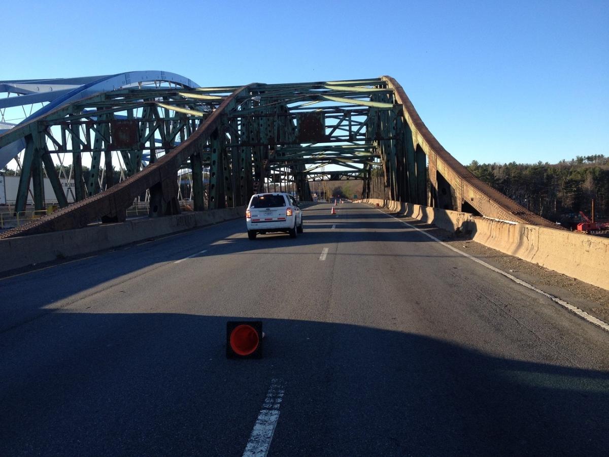 John Greenleaf Whittier Bridge MassDOT sends a final vehicle over the old Whittier Bridge span on December 4, 2015. The bridge will be demolished and replaced with a 2nd new span.