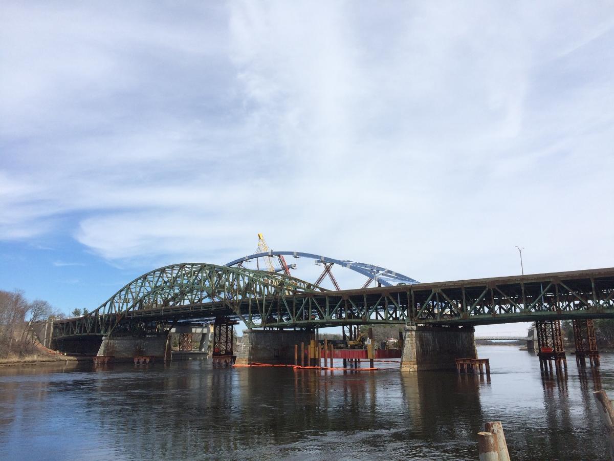 John Greenleaf Whittier Bridge The new northbound Whittier Bridge is visible behind the existing Whittier Bridge from the Merrimack River.