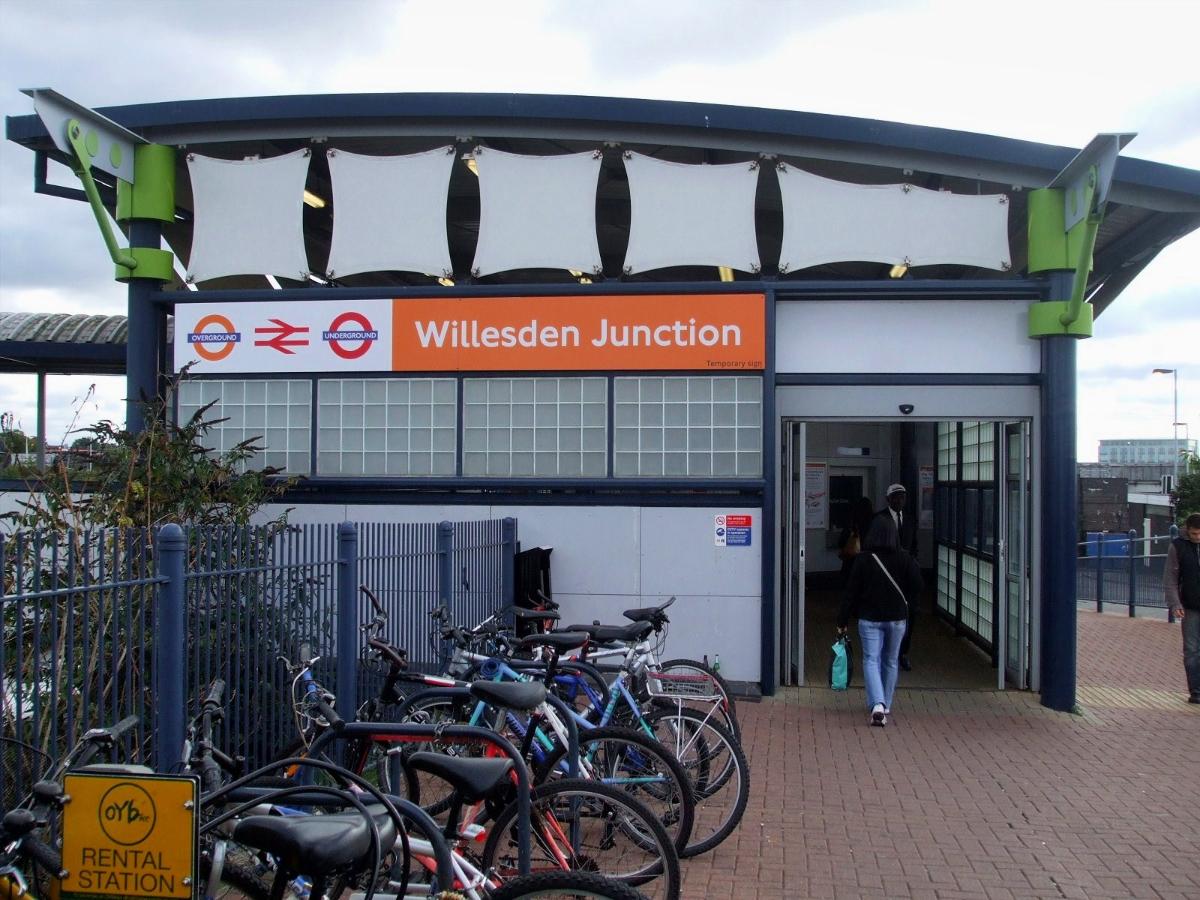 Willesden Junction station northern entrance, near bus stand. Temporary signage 