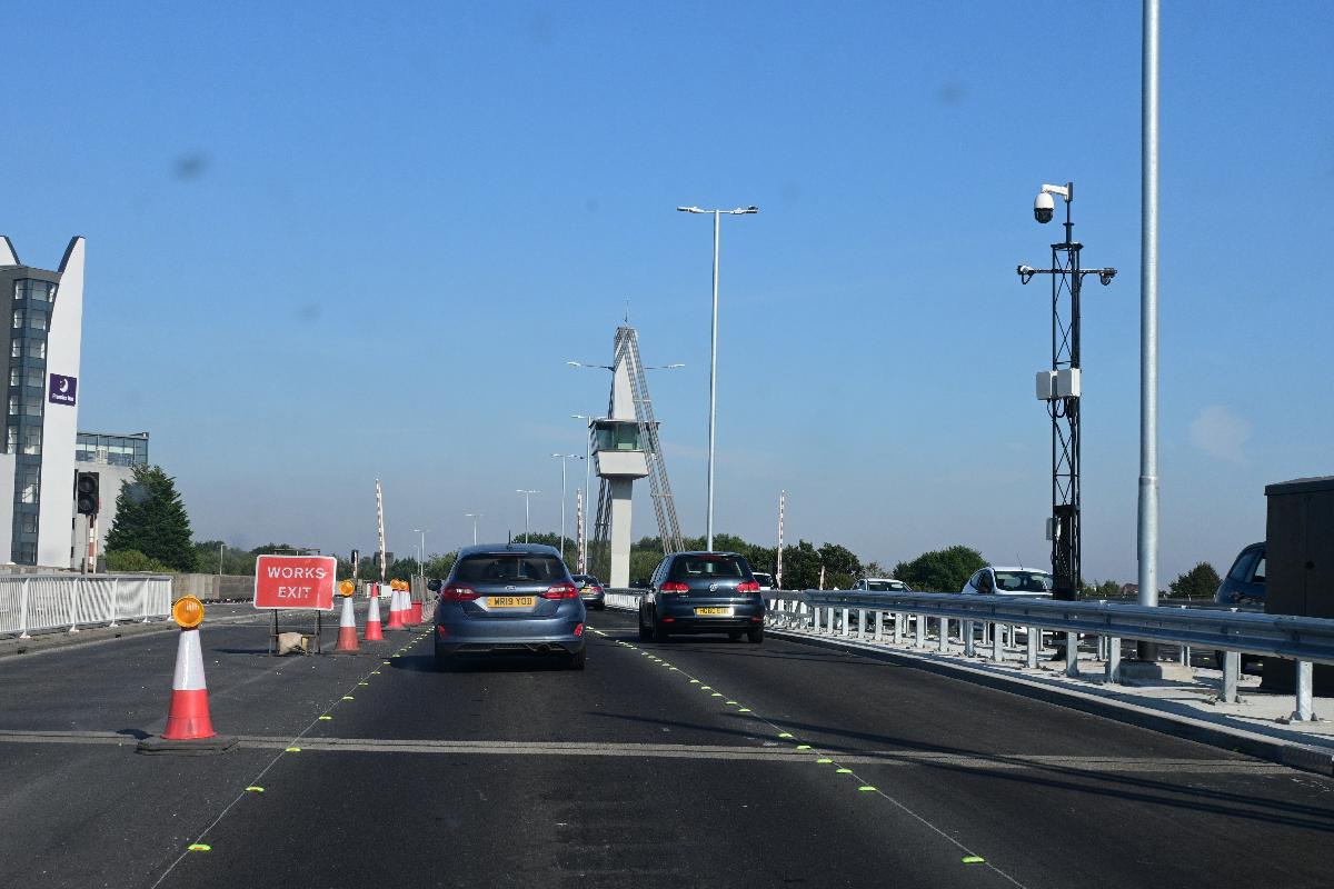 The Myton Bridge in Kingston upon Hull, viewed from the eastbound carriageway New barriers and LED lighting have been installed, while work is nearly complete to convert the bridge from two to three lanes.
N.B. The dust specs on the photographs are not on the photograph itself, but are the byproducts of dirt on my car windshield.