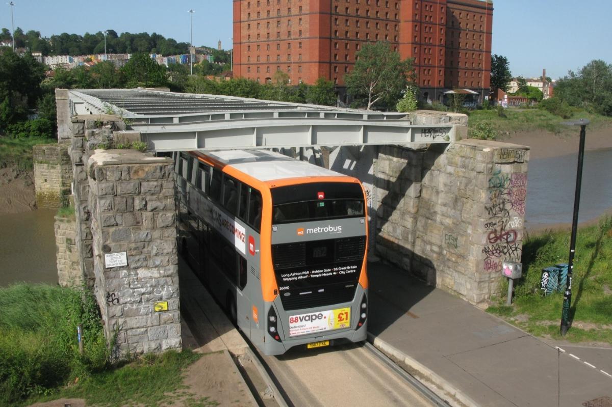 Ashton Avenue Bridge, Bristol A Bristol metrobus (First West of England's 36810 which is registered YM17FKE) crosses the New Cut at Ashton as it heads towards the city centre from the Long Ashton park and ride site.