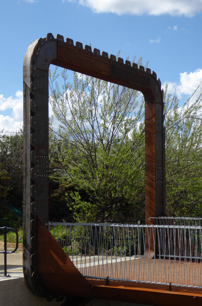 Part of the Cody Dock Rolling Bridge designed by Thomas Randall-Page The square cog design, rolling on catenary curve tracks - together with a balanced centre of gravity - enables the bridge to be rolled between higher and lower positions with minimum effort.