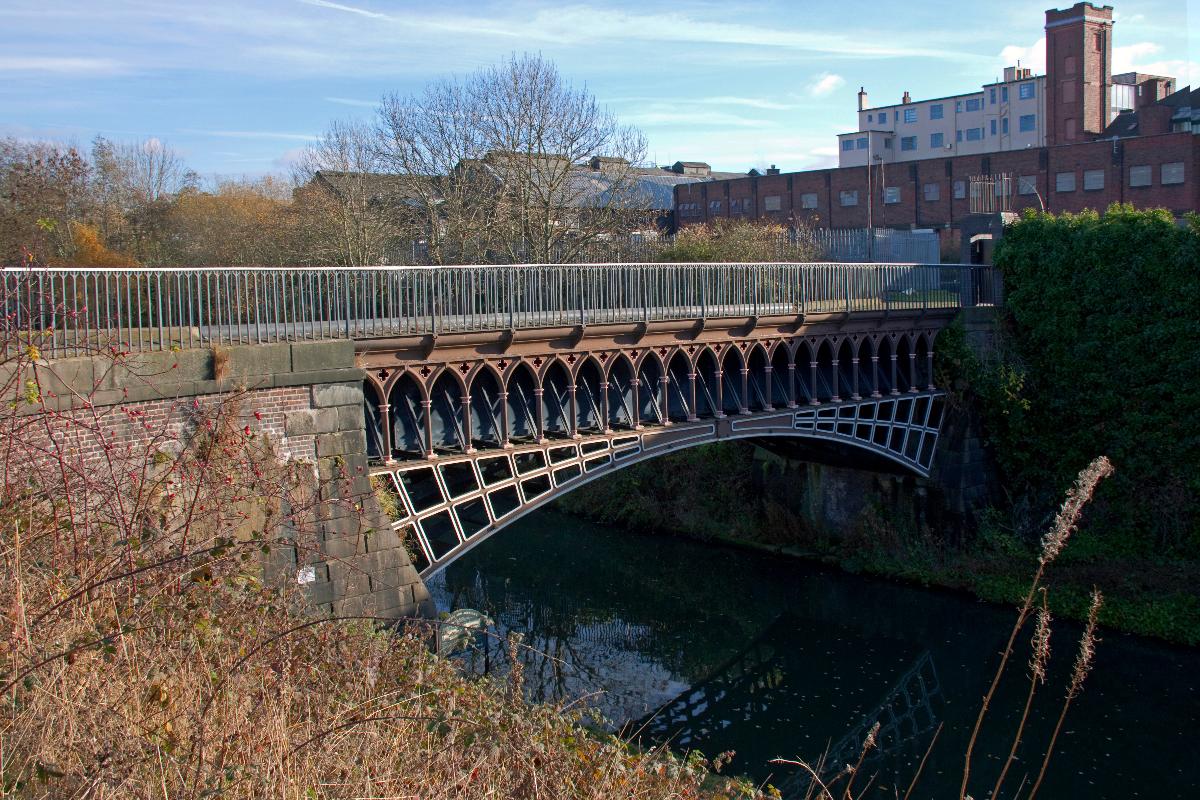 Engine Arm Aqueduct Built around 1828 by Thomas Telford to carry the Engine Arm of the Wolverhampton level canal over the deep cutting of Telford's new Birmingham mainline navigation and thus ensure the continued supply of water from the Rotton Park Reservoir.