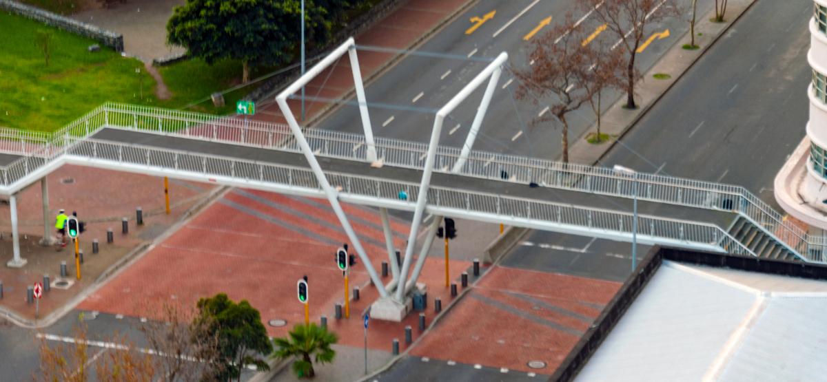 The Fan Bridge for foot traffic on Waterkrant Street crossing Buitengracht Street in Cape Town, seen from the roof of the Strand South hotel 