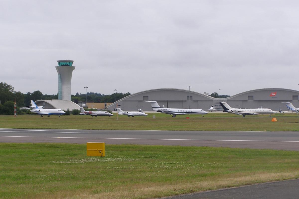 A line-up of business jets at Farnborough Airfield, England 