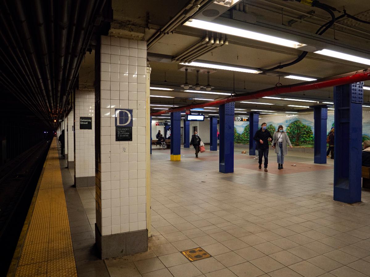 A view of the northbound platform at the IND Sixth Avenue Line's Delancey Street station 