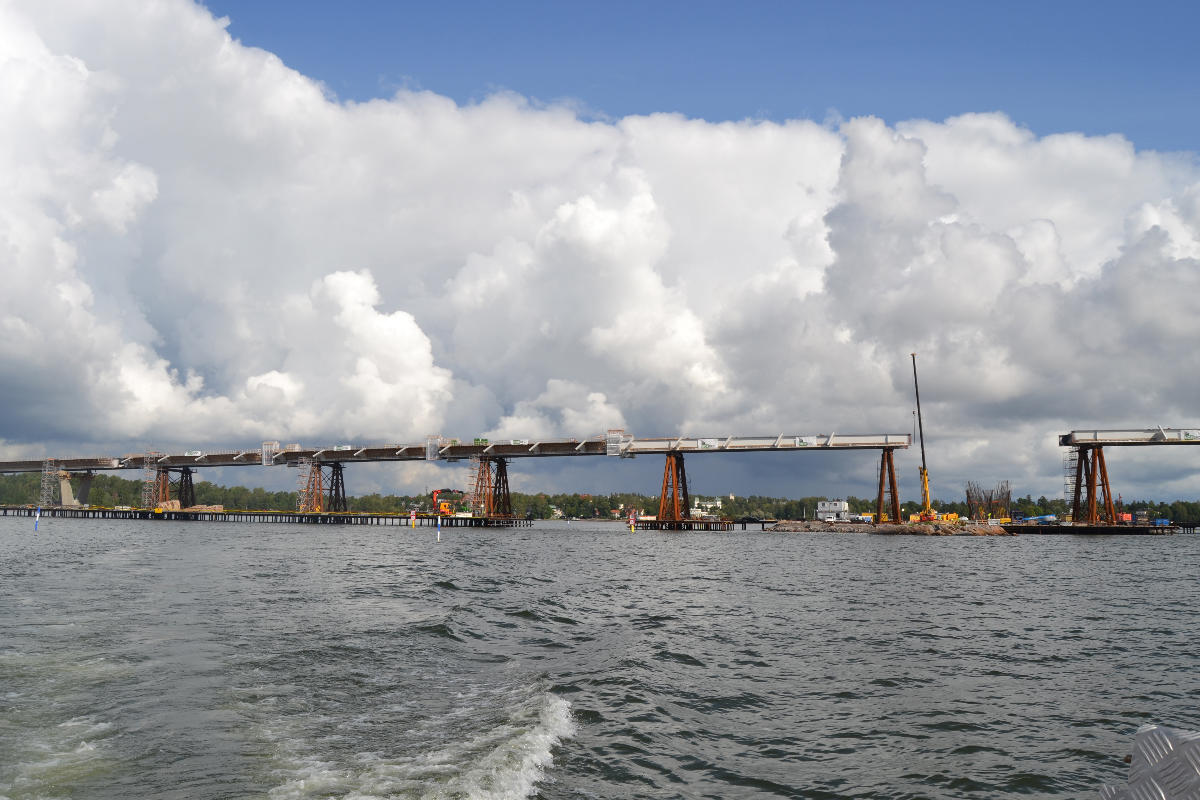Kruunuvuori Bridge near Nimismies islet in Helsinki under construction as seen from the waterway passing under it 