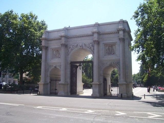 London : Westminster - Marble Arch In 1828, John Nash designed the arch based on the triumphal arch of Constantine in Rome. It was originally erected on The Mall as a gateway to the new Buckingham Palace (rebuilt by Nash from the former Buckingham House).