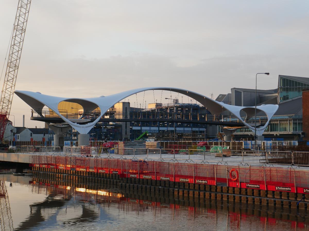 The view from Hull Marina of a newly-installed footbridge over Castle Street in Kingston upon Hull The footbridge, formally named 'Murdoch's Connection' in September 2020, would not open to the public until March 2021.