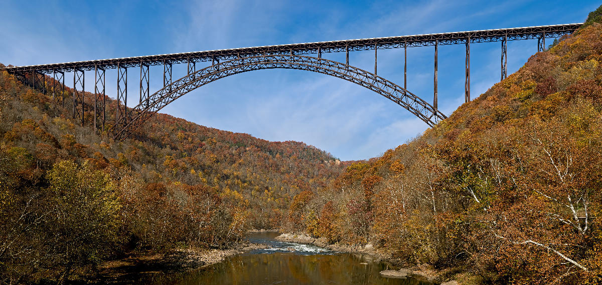 New River Gorge Bridge It is the longest and highest steel arch bridge in the US at 3030 ft (924 m) long and 876 ft (267 m) high.