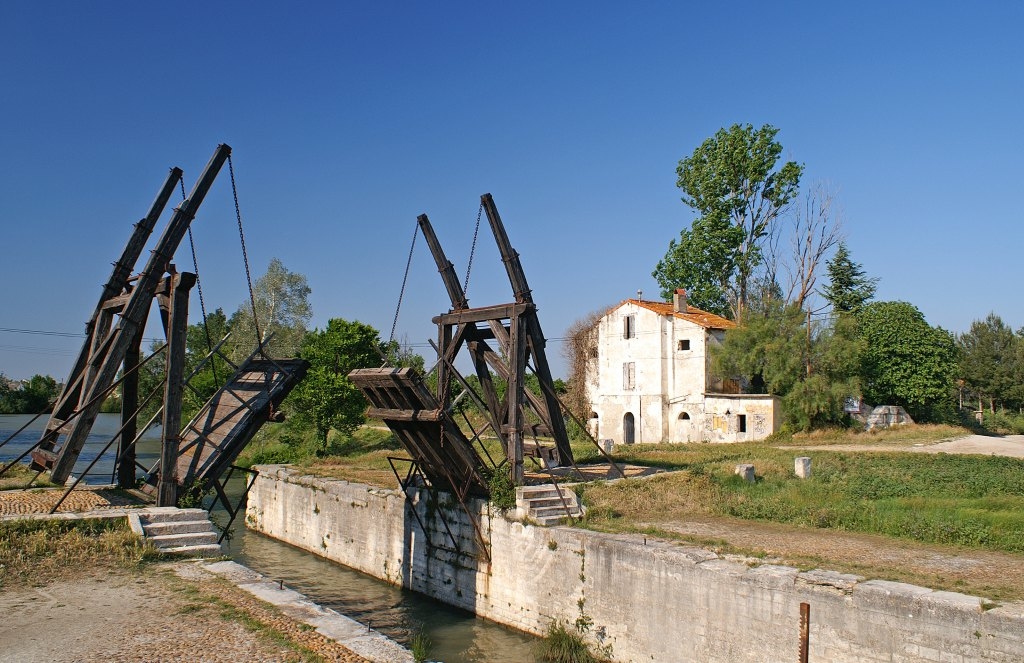 Replica of the Langlois bridge near Arles, France, which was painted by Van Gogh more than once The replica is another bridge of same series, from Fos-sur-Mer, which was set up in 1962, two kilometers south of the original's location. It was completely restored in 1997.
The original bridge was popular under the name of its long-time keeper Langlois. Van Gogh misunderstood that name and interpreted it as l'Anglais. (Englishmen's bridge).