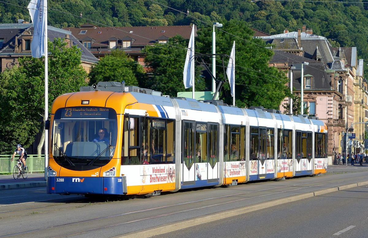 (RNV) tram no. 3288 operating a northbound line 23 service across the Theodor-Heuss-Brücke in , Germany. 