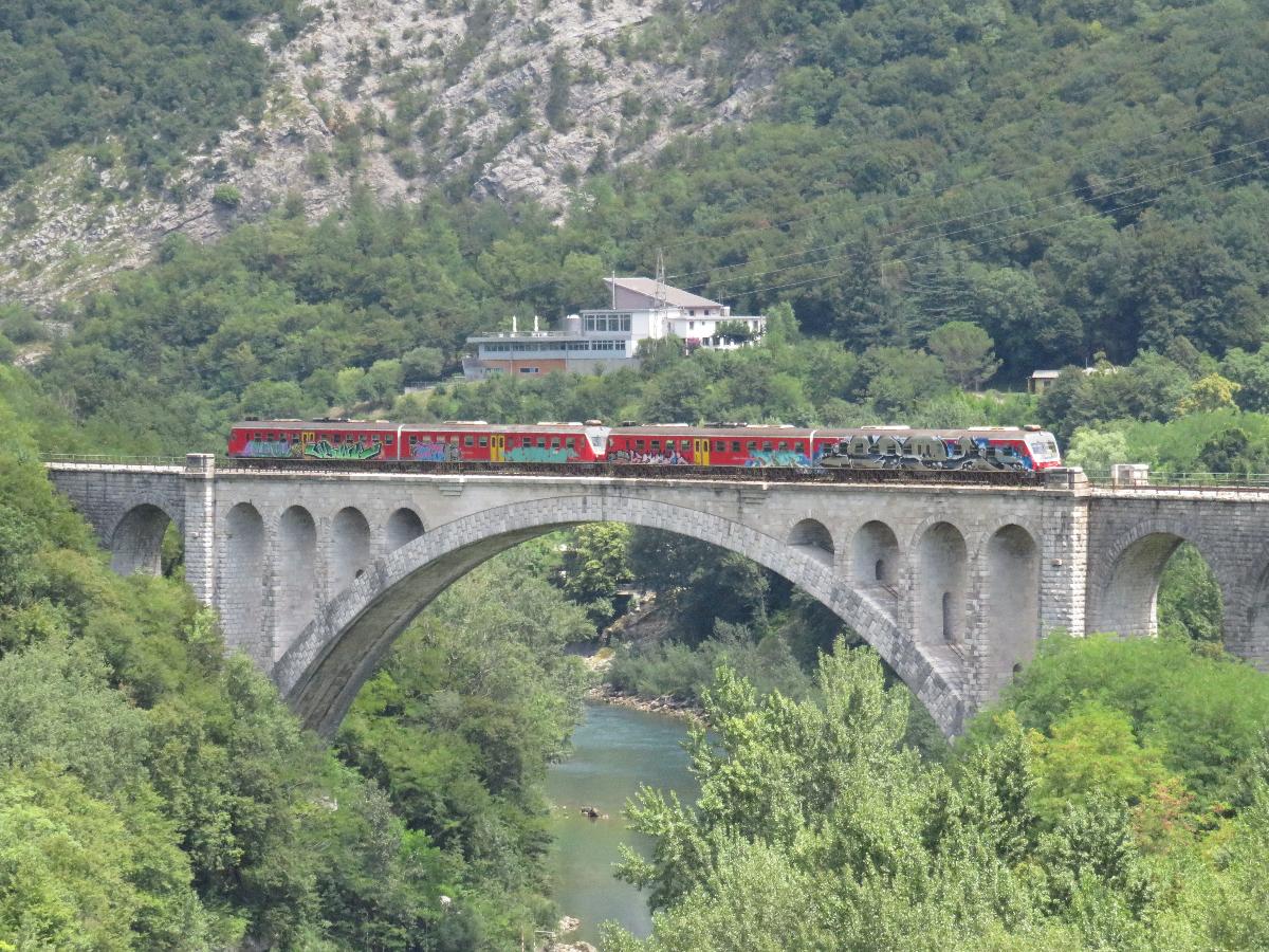 Two SZ 813 trainsets crossing the Solkan bridge 