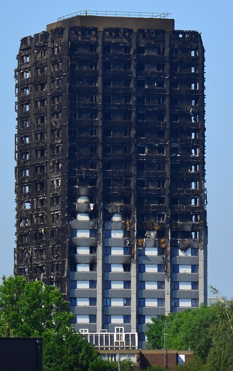 The burned remains of Grenfell Tower in west London, and underneath showing where the fire did not strike as hard 