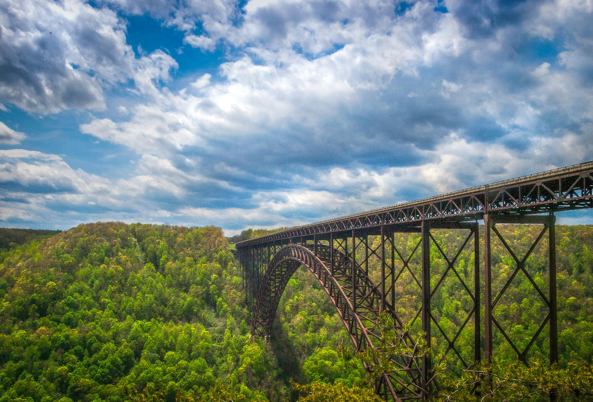 New River Gorge Bridge Seen from the overlook at the north end of the New River Gorge (facing southwards), near Fayetteville, West Virginia. Taken May 5, 2013 using an Olympus E-3 DSLR by Shawn Ullerup.